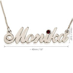 Close-up of birthstone name necklace