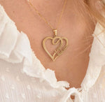 Model wearing heart double-name necklace