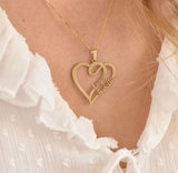 Model wearing heart double-name necklace