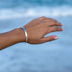 Hidden message bracelet with engraved inner text