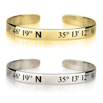 Gold and silver cuff bracelets with engraved coordinates