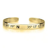 Gold bracelet with engraved coordinates