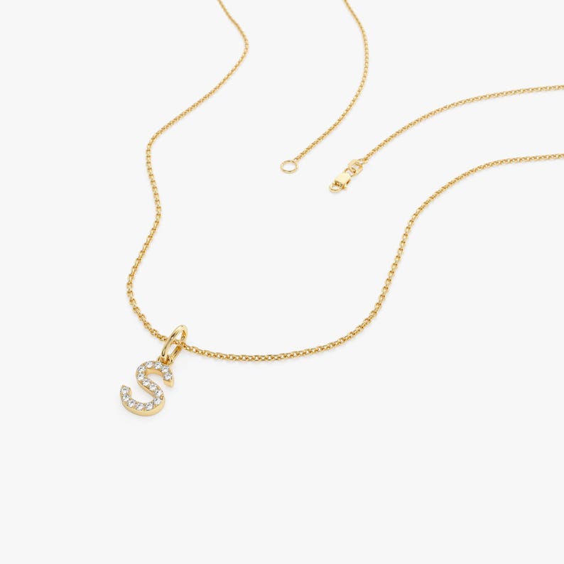 Gold initial pendant with cubic zirconia
